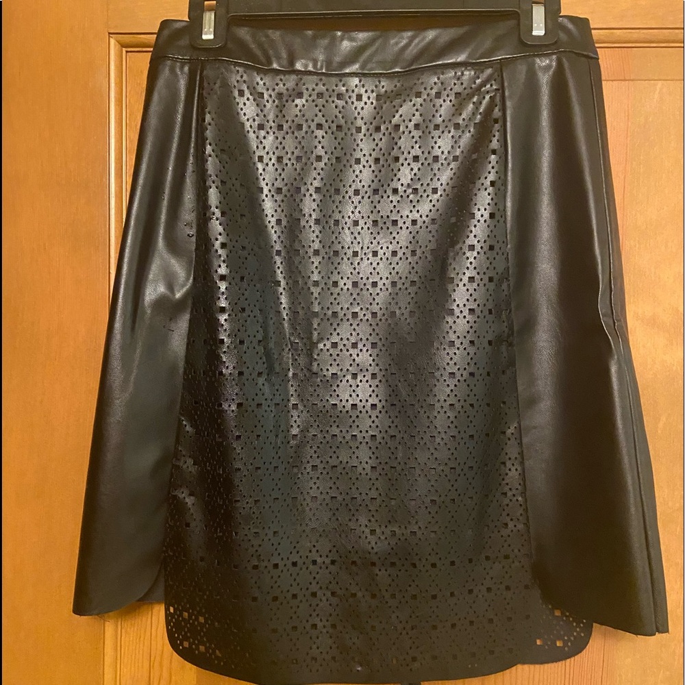 Black lined faux leather skirt never worn tags still on!